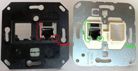 Gira's plastic frame (left) and Jung's steel frame (right). Notice the friction.